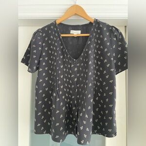 Short sleeve button front top